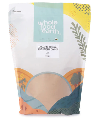 Organic Ceylon cinnamon powder from Whole Food Earth in a 2kg bag, showcasing the fine, light brown spice in a clear container.