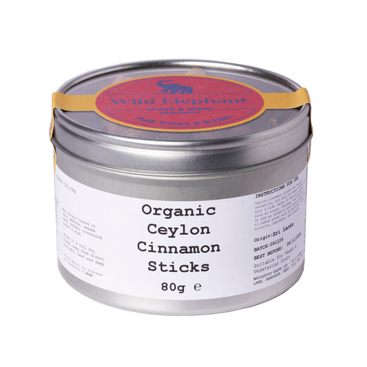 Organic Ceylon cinnamon sticks from Wild Elephant, displayed in a clear jar with several sticks showing their light brown color and smooth texture.