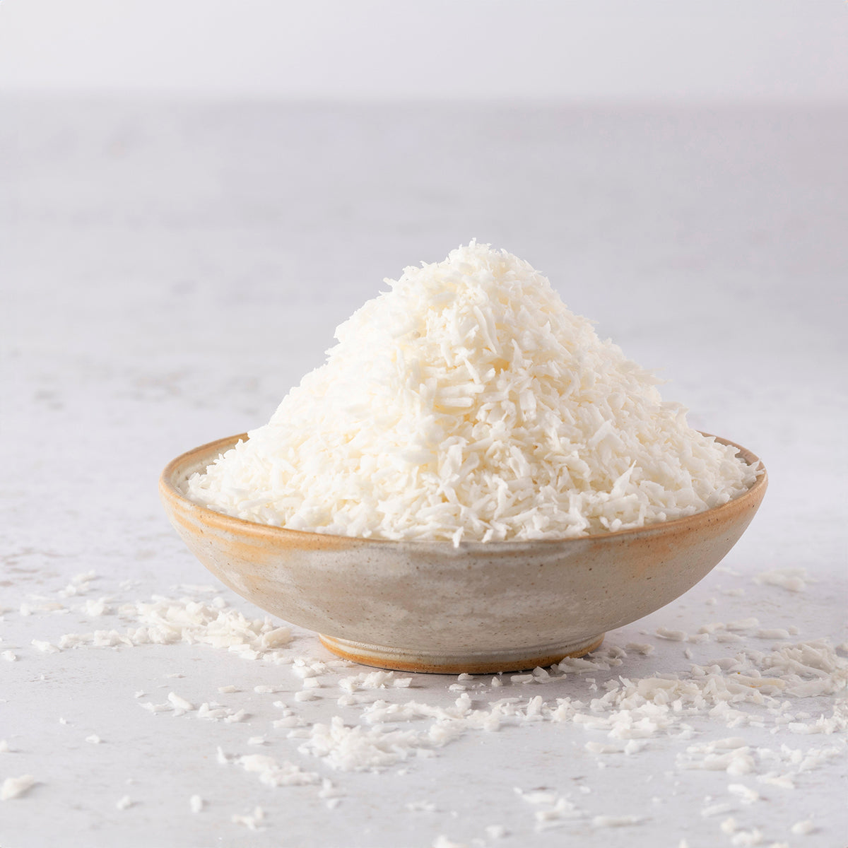 Organic coconut desiccated from Whole Food Earth, showing shredded dried coconut suitable for baking and cooking.