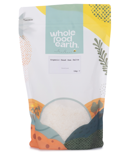 Organic Dead Sea salts from Whole Food Earth, 1kg mineral and salt blend, shown in a clear container with crystalline texture.