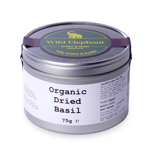 Organic dried basil from Whole Food Earth, wild-harvested herb in a 75g package, showing dried green basil leaves.