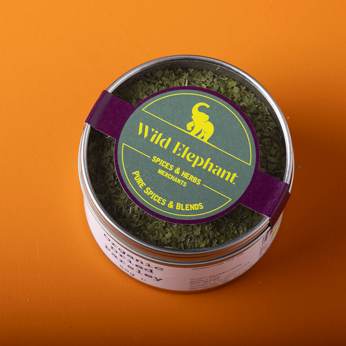 Organic dried parsley from Whole Food Earth, wild-harvested herb in a 50g package, fresh green dried parsley leaves.