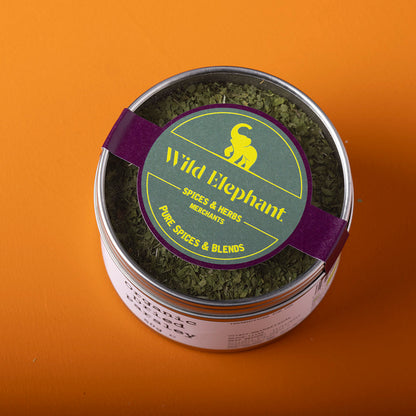 Organic dried parsley from Whole Food Earth, wild-harvested herb in a 50g package, fresh green dried parsley leaves.