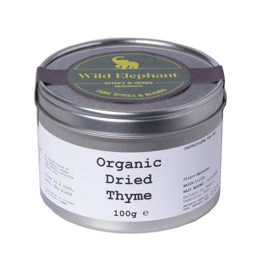 Organic dried thyme herb from Wild Elephant, stored in a 100g package, showcasing fresh green leaves for culinary use.