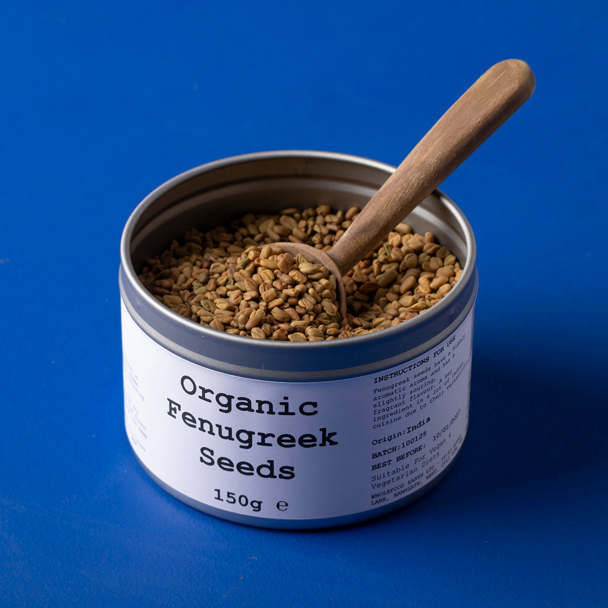 Organic fenugreek seeds from Wild Elephant, 150g, in a clear container, perfect for herbs and spices enthusiasts.
