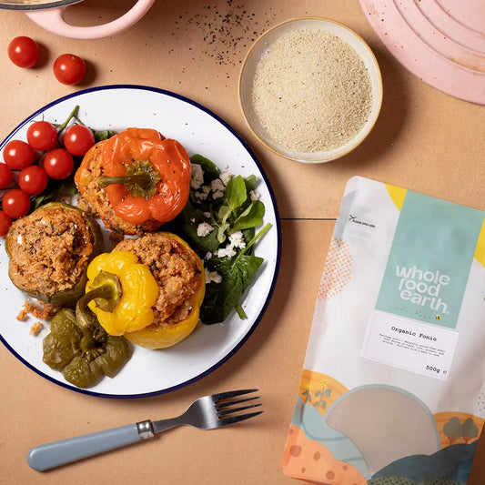 Organic Fonio grains from ArtisanBox displayed in a natural setting, highlighting their light, fluffy texture and organic quality.
