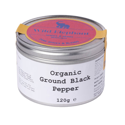 Organic ground black pepper from Wild Elephant, Whole Food Earth herbs and spices, showing fresh black pepper in a clear jar.