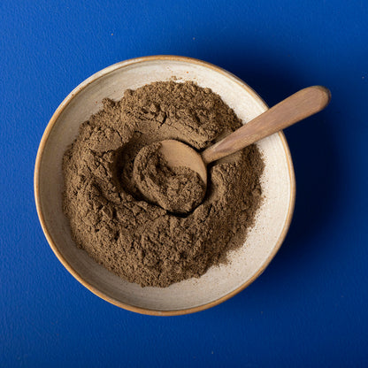 Organic ground black pepper from Wild Elephant, Whole Food Earth herbs and spices, in a clear jar with black peppercorns inside.