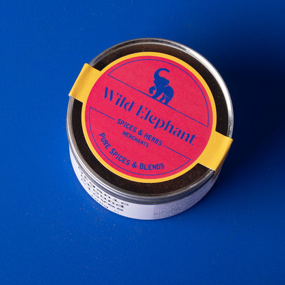 Organic ground cloves from Wild Elephant, 100g, in a clear jar showing dark aromatic spice, part of Whole Food Earth herbs and spices collection.