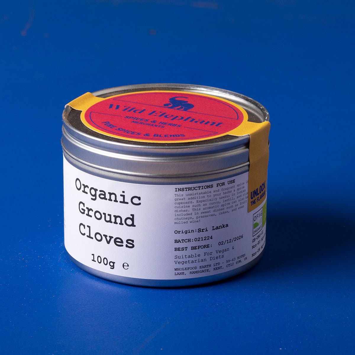Organic ground cloves from Wild Elephant, 100g, showing the aromatic dark spice in a clear container for herbs and spices.