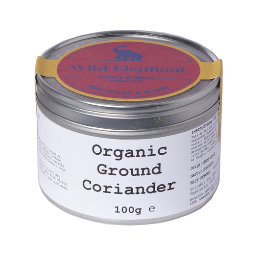Organic ground coriander spice from Wild Elephant, shown in a clear image highlighting the fine, fragrant herb in a 100g package.