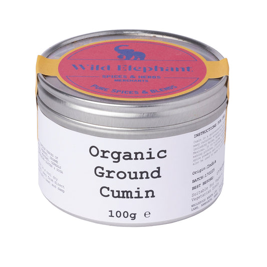 Organic ground cumin from Wild Elephant in a 100g package, showcasing the earthy spice in a clear container.