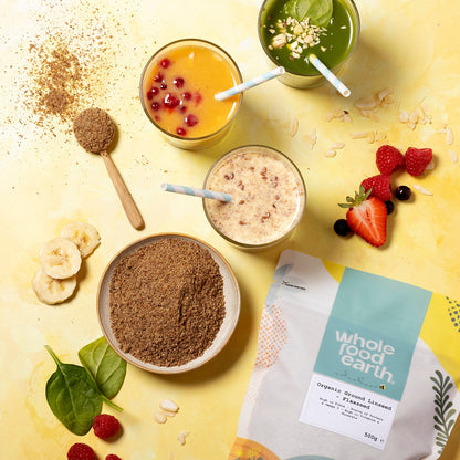 Organic ground flaxseed from Whole Food Earth, close-up of golden flaxseeds in a bowl, highlighting fresh, natural beans and pulses.