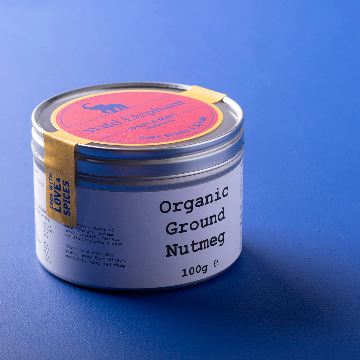 Organic ground nutmeg from Wild Elephant in a 100g package, showing the finely ground spice in a clear container.