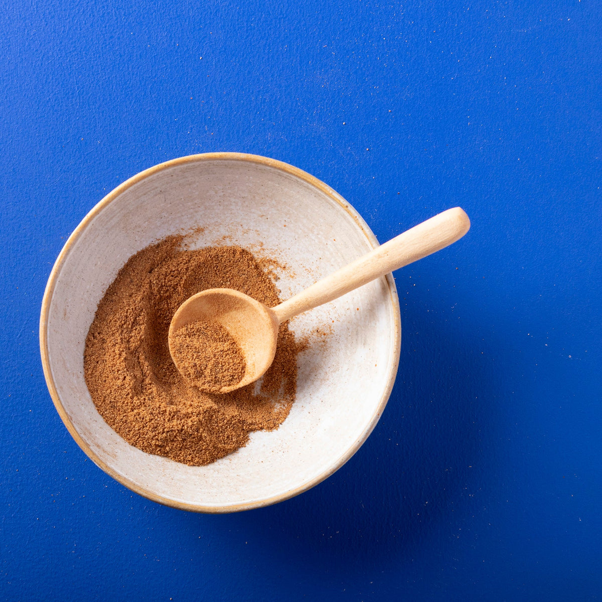 Organic ground nutmeg from Wild Elephant, 100g, showing fresh, finely ground spice in a clear container, part of herbs and spices.