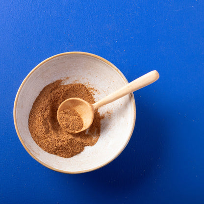 Organic ground nutmeg from Wild Elephant, 100g, showing fresh, finely ground spice in a clear container, part of herbs and spices.