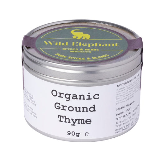 Organic ground thyme from Wild Elephant, 90g, in a clear jar, showcasing fresh, aromatic organic herbs and spice packaging.