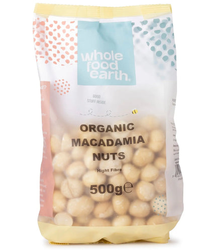 Organic Whole Food Earth macadamia nuts in a 500g package, showcasing crunchy, whole nuts and seeds in a clear view.