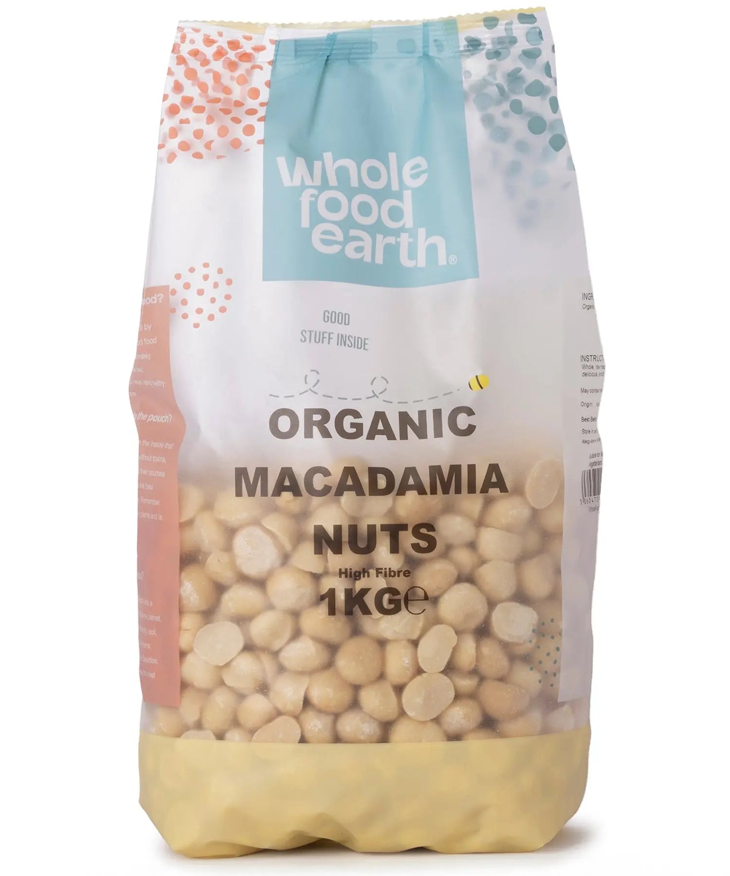 Organic Whole Food Earth macadamia nuts in a 1kg package, showing creamy, whole nuts and their textured shells.