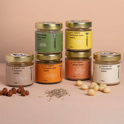 Assorted organic nut and seed butters in a selection box from Whole Food Earth, featuring different flavors and textures.