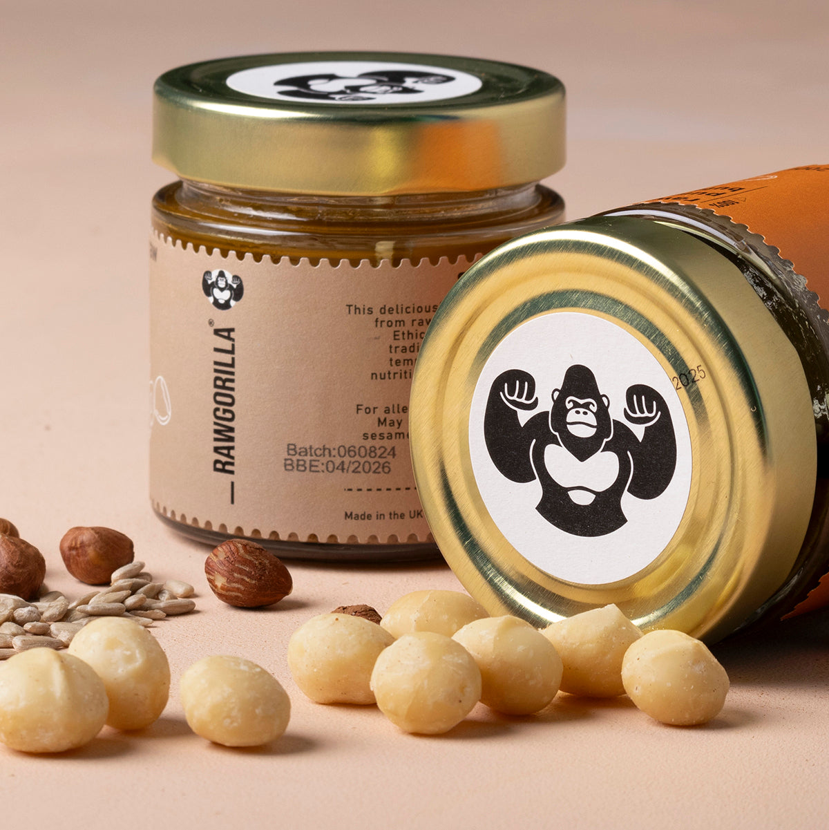 Assorted organic nut and seed butters in small jars from Whole Food Earth, displayed in a selection box on a white background.