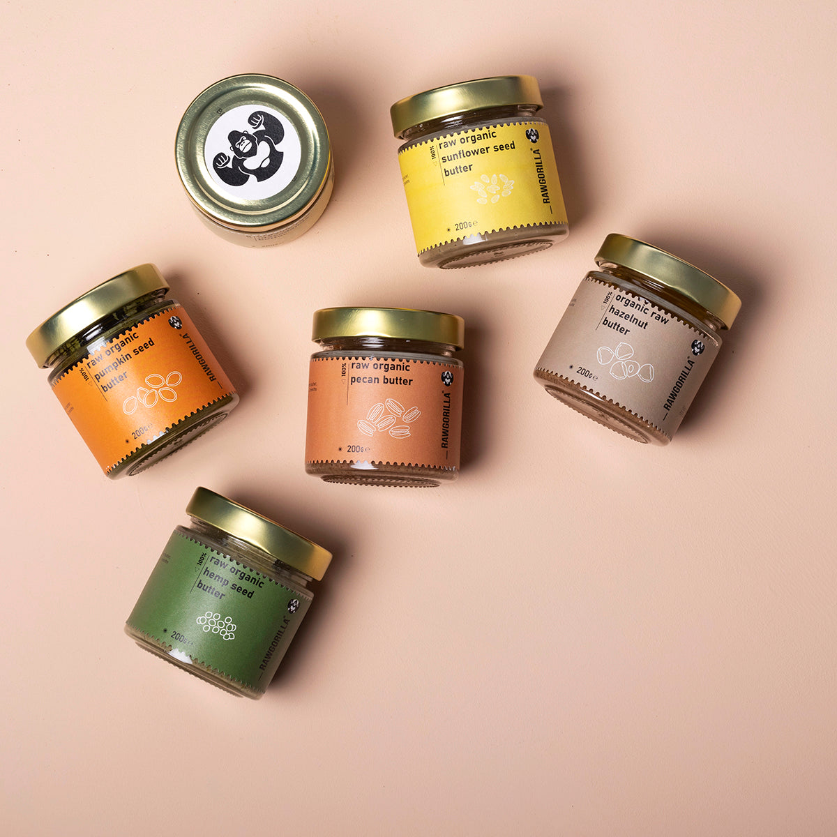 Assorted organic nut and seed butters in a selection box, featuring various flavors from Whole Food Earth brand.