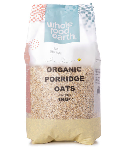 Whole Food Earth organic porridge oats in a 1kg package, showing the cereal's natural, textured appearance.