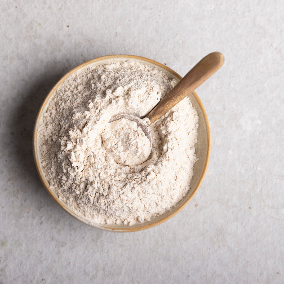 Organic Psyllium Husk Powder from Whole Food Earth, showing the fine, light brown powder used as a dietary fiber supplement.