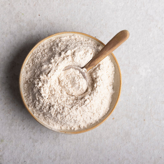 Organic Psyllium Husk Powder from Whole Food Earth, showing the fine, light brown powder used as a dietary fiber supplement.