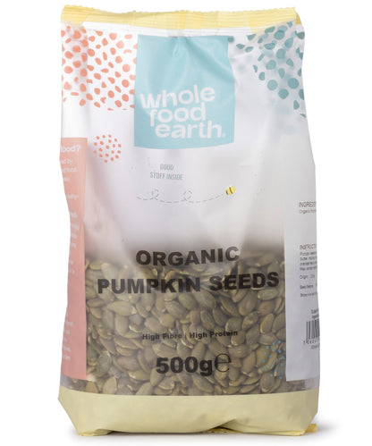 Organic pumpkin seeds from Whole Food Earth, small green seeds in a clear bag, ideal for snacking and baking.