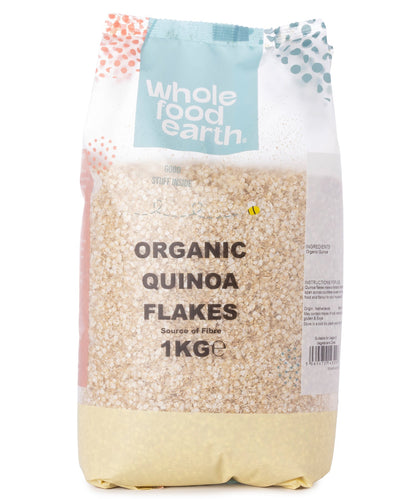 Organic quinoa flakes in a 1kg package from Whole Food Earth, showing the gluten-free cereal product with a natural grain appearance.