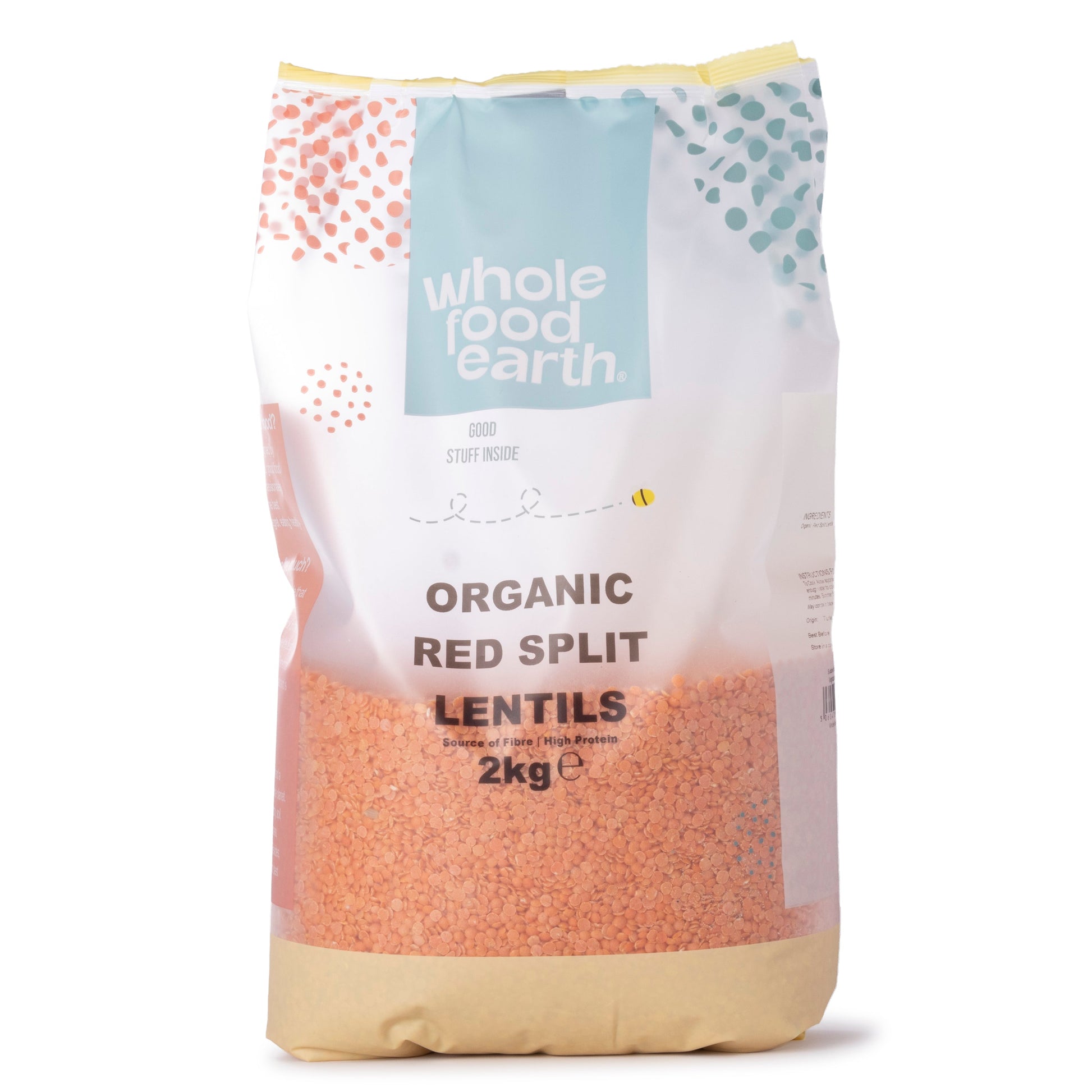 Organic red split lentils from Whole Food Earth, displayed in a clear bag, showing vibrant orange-red pulses suitable for cooking.