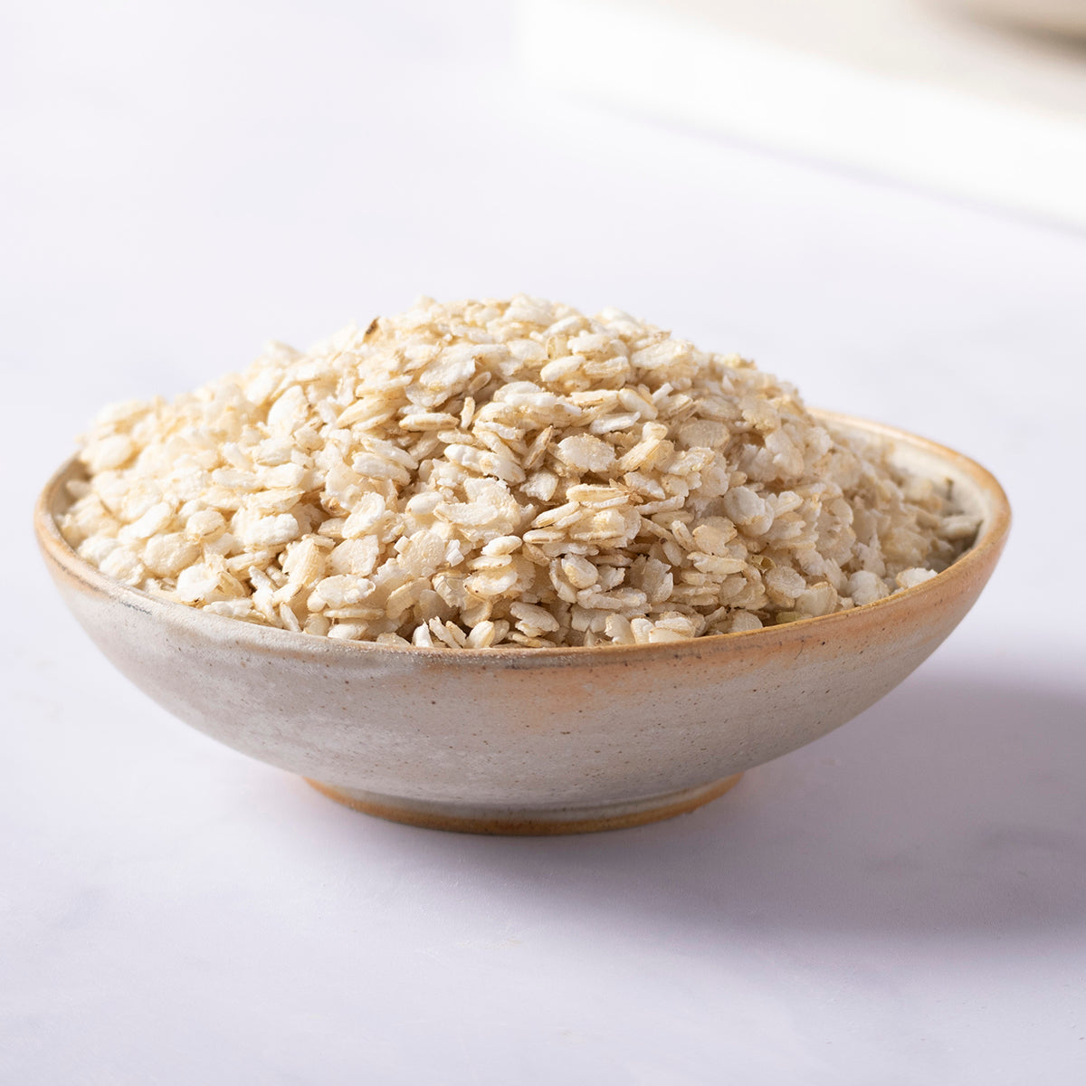Organic rice flakes from Whole Food Earth, close-up of light, crispy rice flakes used in cereals and breakfast dishes.