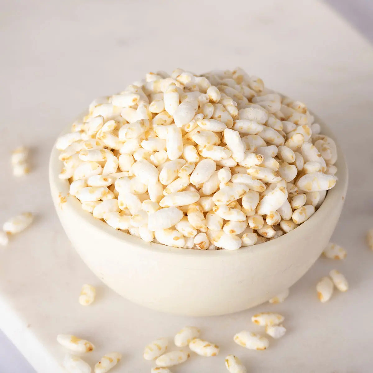 Organic rice puffs from Whole Food Earth, showing a bowl of light, crispy rice cereal made from organic grains.