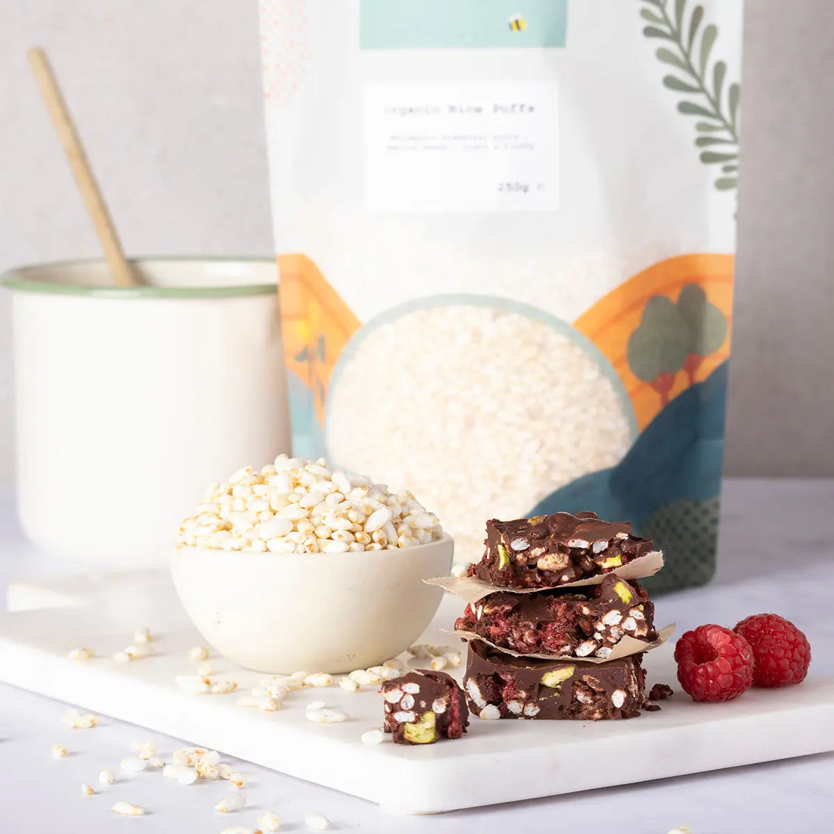 Organic rice puffs from Whole Food Earth displayed in a bowl, showcasing their light, crispy texture and natural rice appearance.