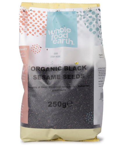 Black organic sesame seeds from Whole Food Earth, shown in a clear close-up image, perfect for healthy cooking and baking.