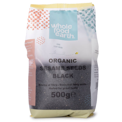 Black organic sesame seeds from Whole Food Earth, small bowl of seeds, natural and crunchy, in a clear glass container.