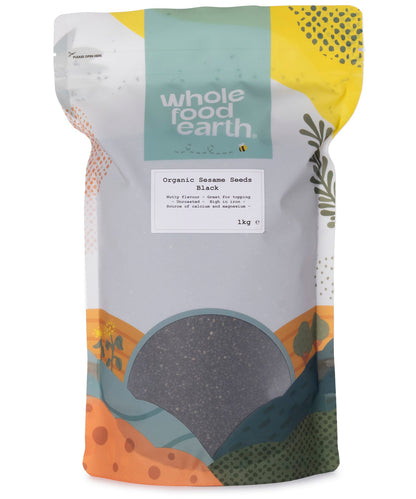 Black organic sesame seeds from Whole Food Earth, shown in a clear container, ideal for cooking and baking.
