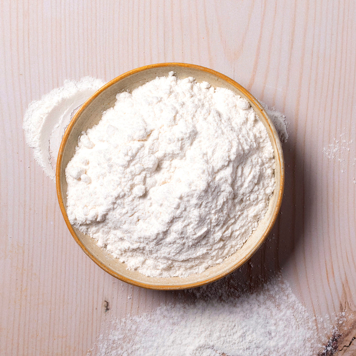 Organic sugar cane powder from Whole Food Earth, showing a close-up of the natural, granulated sweetener in a glass jar.