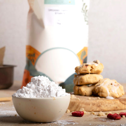 Organic tapioca starch in a natural kitchen setting, showing a bag of Whole Food Earth tapioca flour on a wooden surface.