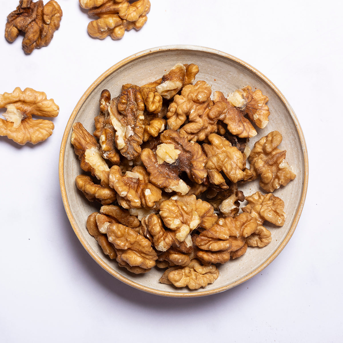 Organic walnut halves from Whole Food Earth, showcasing fresh, crunchy nuts in their natural form.