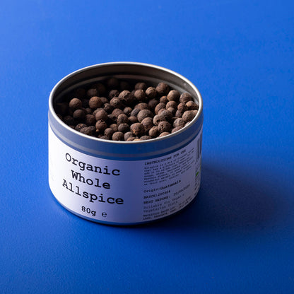 Organic whole allspice from Whole Food Earth, wild-harvested herbs and spices, displayed in an 80g jar.