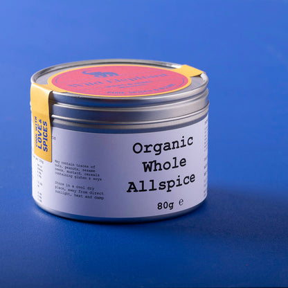 Organic whole allspice berries from Wild Elephant, 80g, in a natural herbs and spices setting, highlighting fresh, whole spice grains.