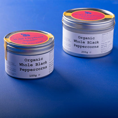 Organic Whole Black Peppercorns from Wild Elephant, Whole Food Earth herbs and spices, showing fresh, whole black peppercorns in a close-up image.
