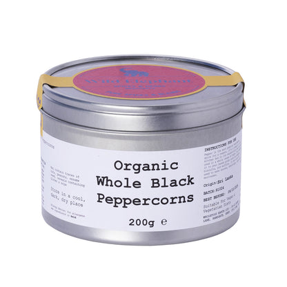 Organic Whole Black Peppercorns from Wild Elephant, Whole Food Earth herbs and spices, shown in a clear close-up image.