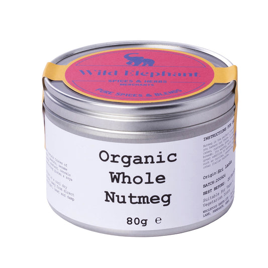 Organic whole nutmeg from Wild Elephant, displayed in a small jar with whole, aromatic nutmeg seeds for culinary use.