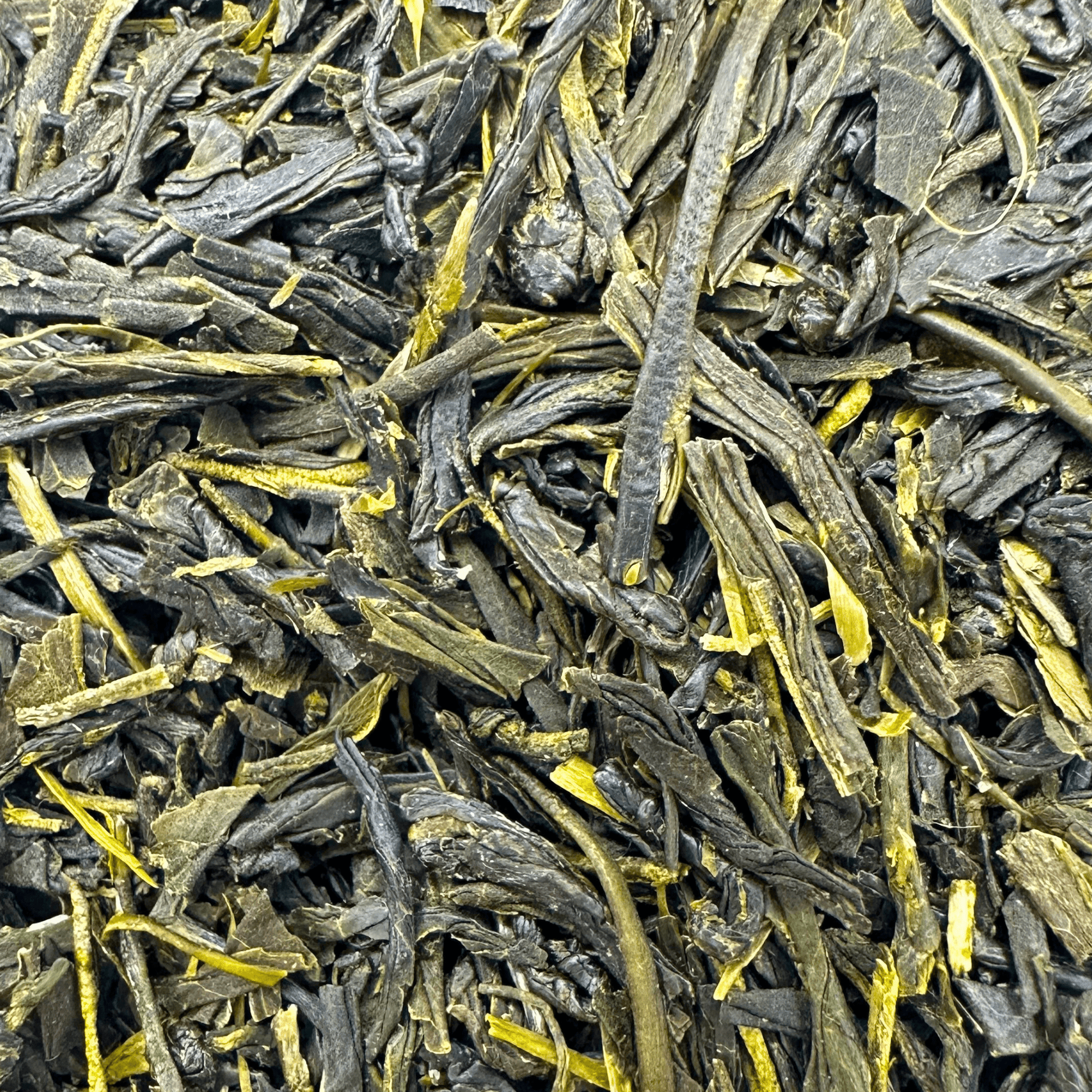 Organic Gyokuro green tea leaves from Porter Hill Tea Company, showcasing vibrant green, high-quality tea leaves in a close-up shot.