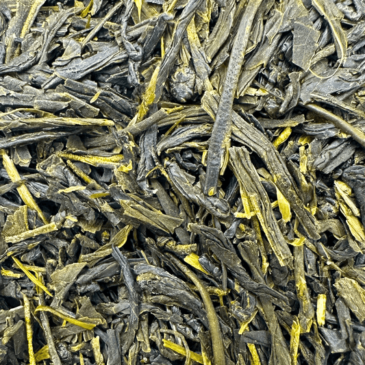Fresh organic Gyokuro green tea leaves from Porter Hill Tea Company, showcasing vibrant, high-quality green tea leaves.
