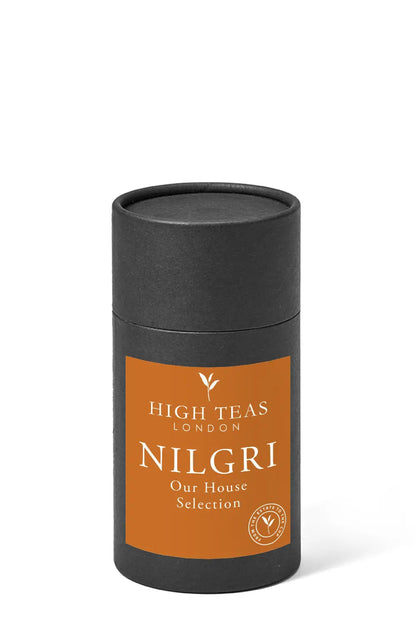 Loose leaf Nilgiri "Blue Mountain" SFTGFOP1 tea from High Teas, showcasing premium blue mountain tea leaves in a natural setting.