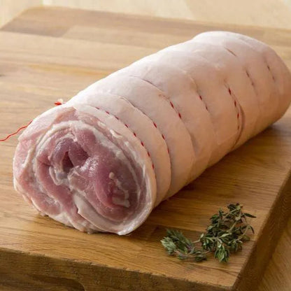 Boneless pork belly joint from Primrose Herd, showcasing fresh, skinless pork belly for roasting or roasting dishes.